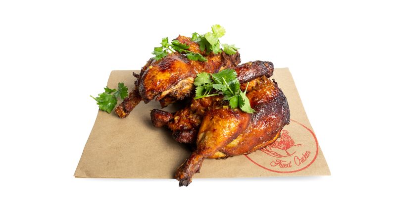Slow-roasted, juicy chicken infused with lemongrass, coriander, and garlic.